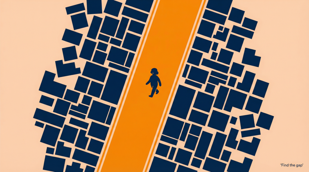 Person walking through a gap between dense blocks